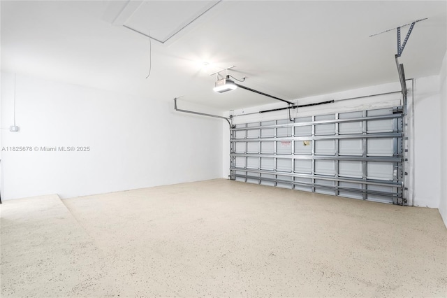 9047 Baybury Ln, West Palm Beach, FL 33411 - garage with a garage door opener