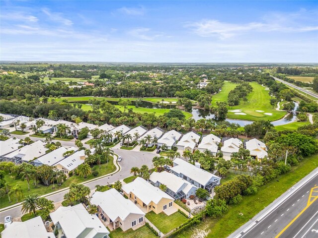 9047 Baybury Ln, West Palm Beach, FL 33411 - aerial overview of property's location featuring a nearby body of water and nearby suburban area