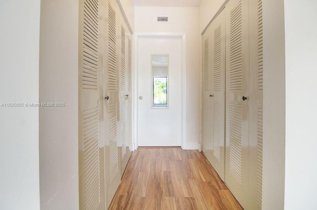 14716 Breckness Pl, Miami Lakes, FL 33016 - hall with light wood-type flooring and baseboards