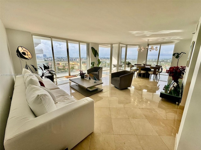 8925 Collins Ave Unit 9G, Surfside, FL 33154 - living room featuring a wall of windows and a chandelier