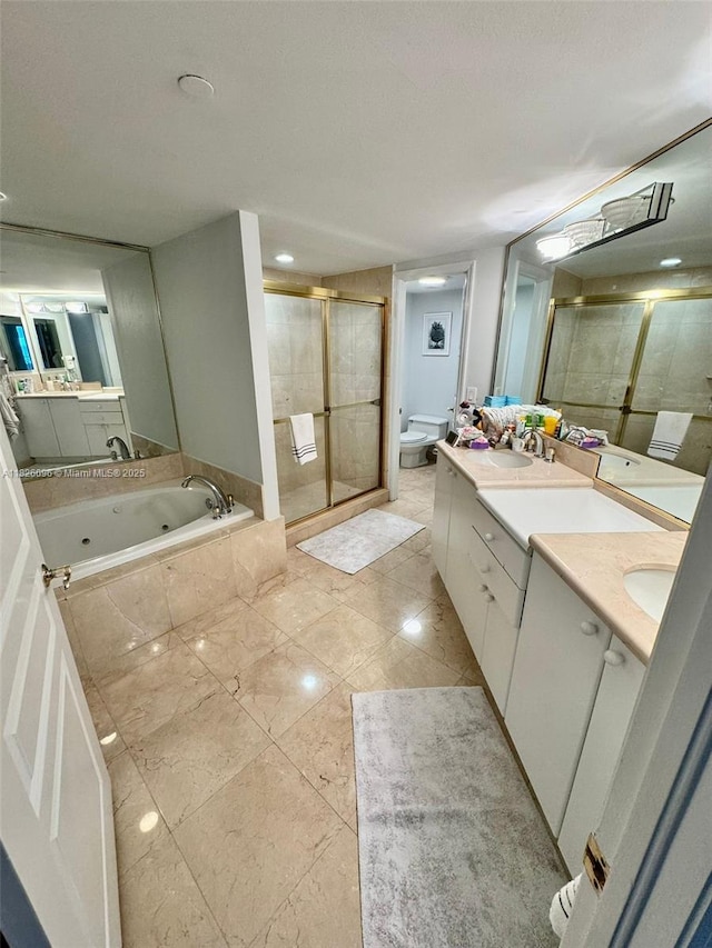 8925 Collins Ave Unit 9G, Surfside, FL 33154 - bathroom with a shower stall, double vanity, a jetted tub, and tile patterned flooring
