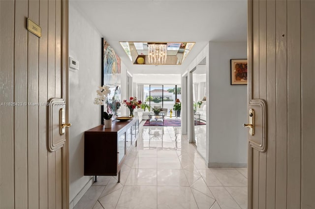 20281 E Country Club Dr Unit 201, Aventura, FL 33180 - entrance foyer with a skylight and light tile patterned floors