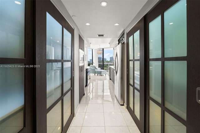 20281 E Country Club Dr Unit 201, Aventura, FL 33180 - hall featuring light tile patterned floors and recessed lighting