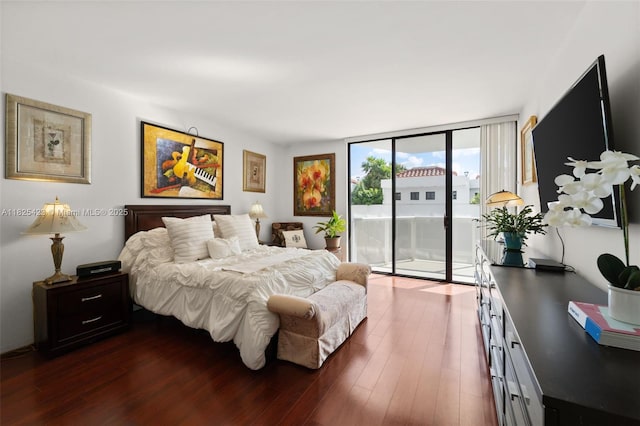 20281 E Country Club Dr Unit 201, Aventura, FL 33180 - bedroom featuring access to outside, a wall of windows, and dark wood-style flooring