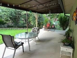 1025 SW Placetas Ave, Port St Lucie, FL 34953 - view of patio / terrace
