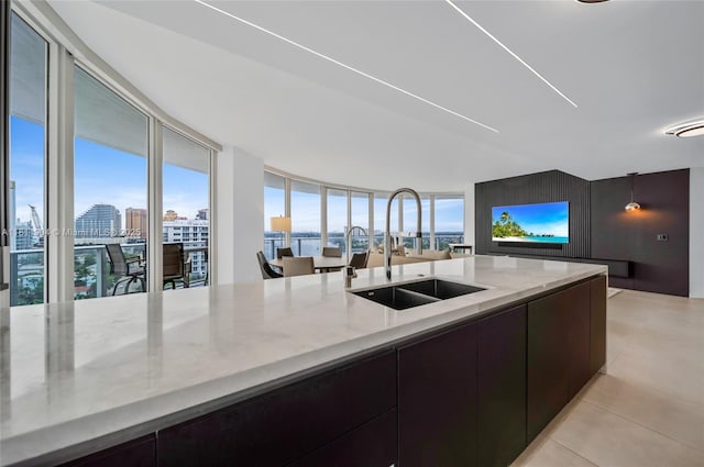 401 N Birch Rd Unit 1100, Fort Lauderdale, FL 33304 - kitchen featuring modern cabinets, light stone countertops, a city view, and healthy amount of natural light