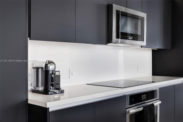 401 N Birch Rd Unit 1100, Fort Lauderdale, FL 33304 - kitchen featuring appliances with stainless steel finishes, modern cabinets, and light countertops