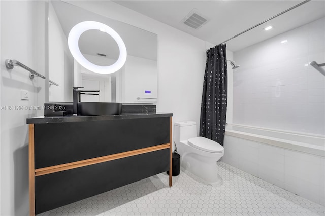 401 N Birch Rd Unit 1100, Fort Lauderdale, FL 33304 - bathroom featuring tiled shower / bath, vanity, and tile patterned flooring