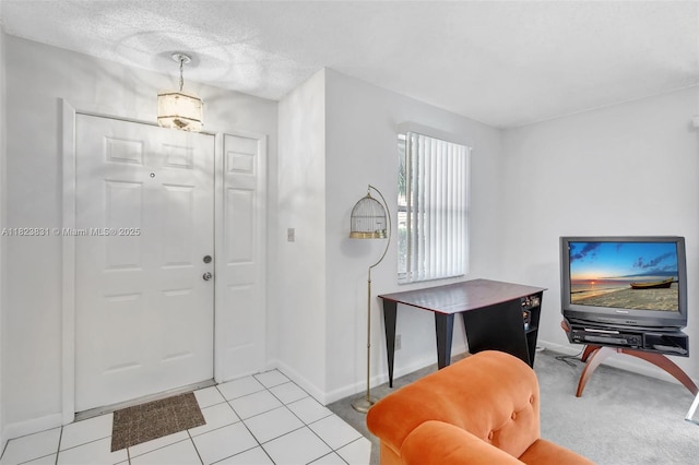 1077 SW 120th Ave, Davie, FL 33325 - entrance foyer featuring light tile patterned flooring and a textured ceiling