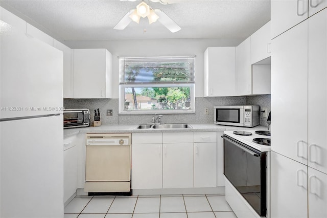 1077 SW 120th Ave, Davie, FL 33325 - kitchen with white appliances, decorative backsplash, light countertops, ceiling fan, and a textured ceiling