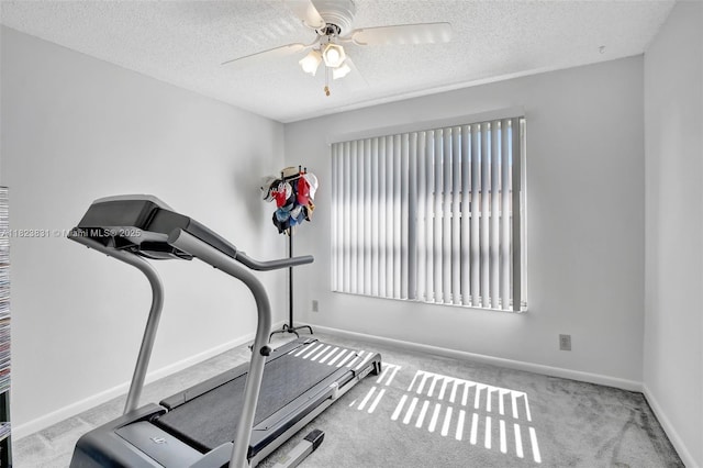 1077 SW 120th Ave, Davie, FL 33325 - workout room with a textured ceiling, ceiling fan, and carpet flooring
