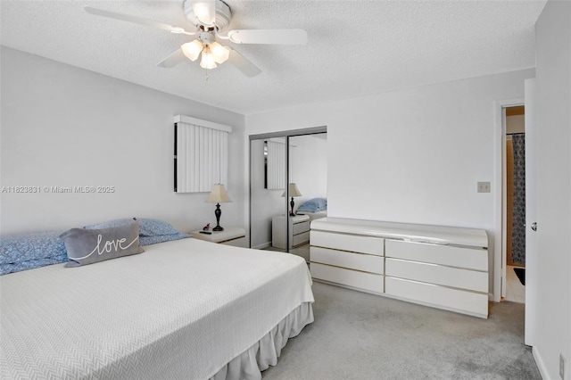 1077 SW 120th Ave, Davie, FL 33325 - carpeted bedroom featuring a closet, a textured ceiling, and ceiling fan
