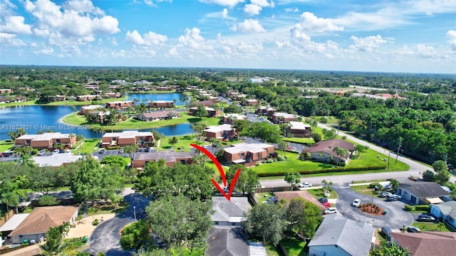 1077 SW 120th Ave, Davie, FL 33325 - aerial perspective of suburban area with a large body of water