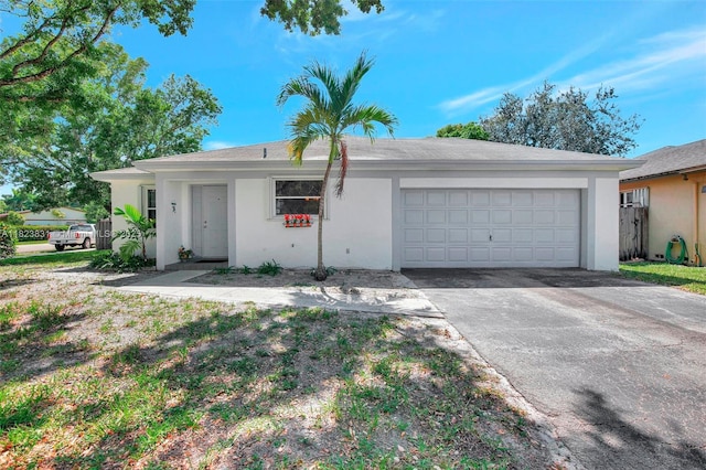 1077 SW 120th Ave, Davie, FL 33325 - ranch-style house featuring concrete driveway, stucco siding, and a garage