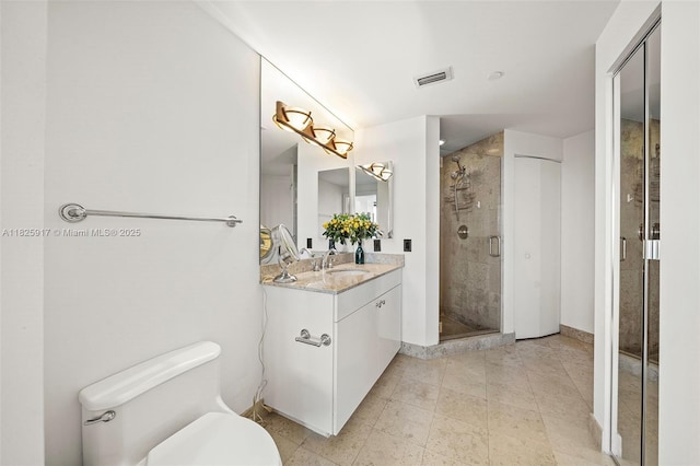 4779 Collins Ave Unit 702, Miami Beach, FL 33140 - bathroom featuring vanity, a stall shower, and tile patterned flooring