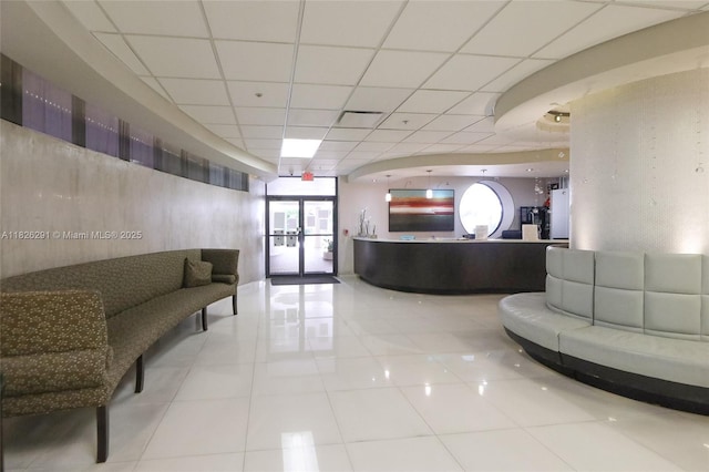 1621 Collins Ave Unit 708, Miami Beach, FL 33139 - reception area featuring a paneled ceiling and french doors