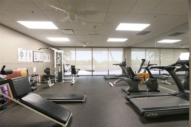1621 Collins Ave Unit 708, Miami Beach, FL 33139 - exercise room with a drop ceiling and ceiling fan