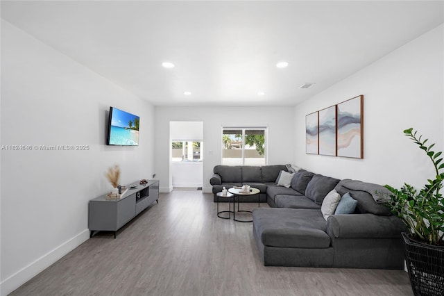 5290 Palm Ave, Hialeah, FL 33012 - living area featuring recessed lighting and wood finished floors