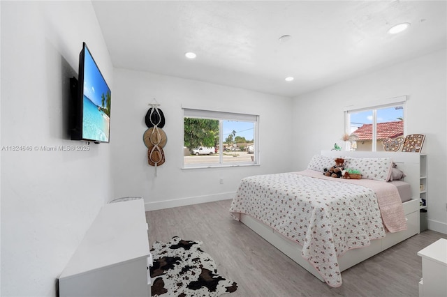 5290 Palm Ave, Hialeah, FL 33012 - bedroom featuring light wood-style floors and recessed lighting