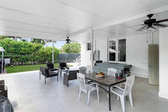 5290 Palm Ave, Hialeah, FL 33012 - view of patio featuring ceiling fan, outdoor dining area, and french doors