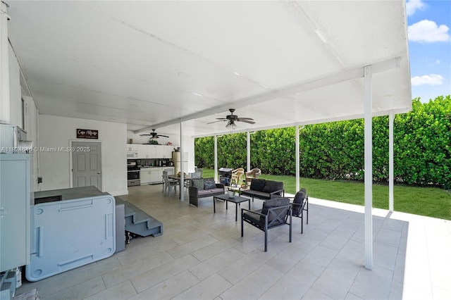 5290 Palm Ave, Hialeah, FL 33012 - view of patio with a ceiling fan, an outdoor hangout area, and exterior kitchen