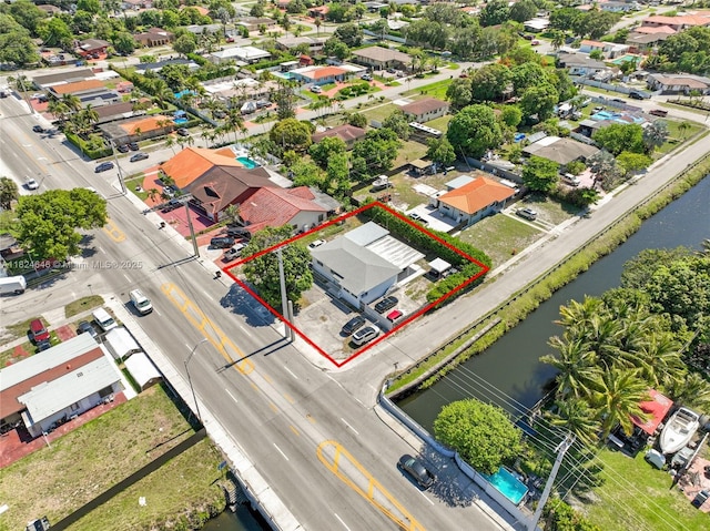 5290 Palm Ave, Hialeah, FL 33012 - aerial view of residential area with property boundaries highlighted and a nearby body of water