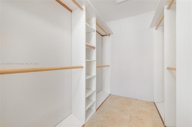 14711 SW 170th Ter, Miami, FL 33187 - walk in closet featuring tile patterned floors