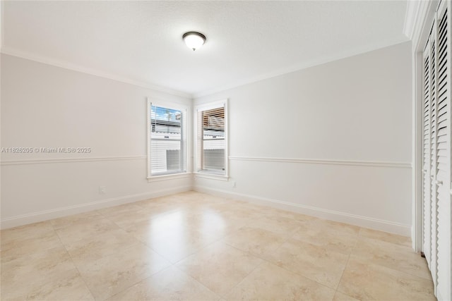 14711 SW 170th Ter, Miami, FL 33187 - tiled spare room featuring ornamental molding