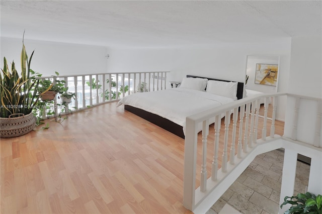 6770 Indian Creek Dr Unit Te, Miami Beach, FL 33141 - bedroom featuring wood finished floors