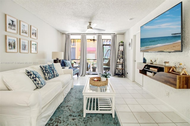 15549 N Miami Lakeway N Unit 104, Miami Lakes, FL 33014 - living area with tile patterned floors, a ceiling fan, floor to ceiling windows, and a textured ceiling