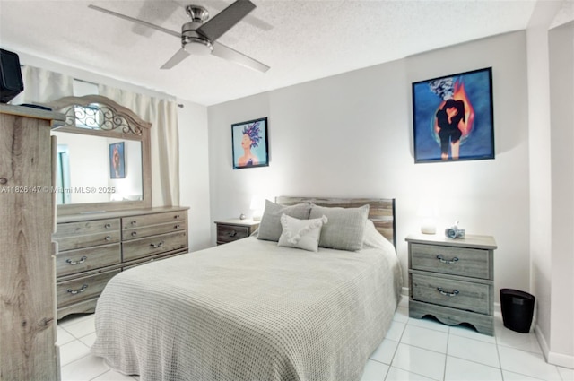 15549 N Miami Lakeway N Unit 104, Miami Lakes, FL 33014 - bedroom with light tile patterned floors and ceiling fan