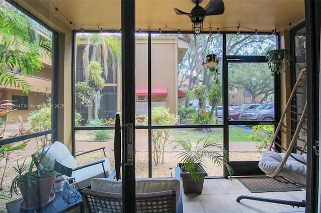 15549 N Miami Lakeway N Unit 104, Miami Lakes, FL 33014 - sunroom featuring ceiling fan