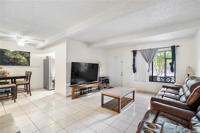 1125 S Flagler Ave Unit 511, Pompano Beach, FL 33060 - living room featuring light tile patterned floors, a textured ceiling, and ceiling fan