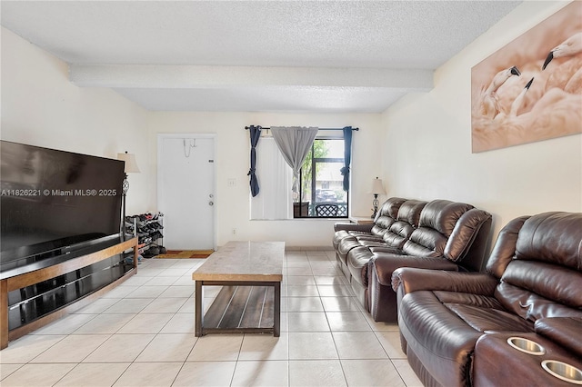 1125 S Flagler Ave Unit 511, Pompano Beach, FL 33060 - living room featuring beam ceiling, light tile patterned floors, and a textured ceiling