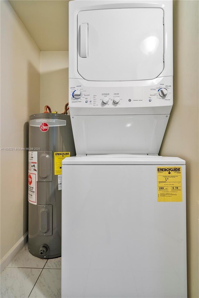 1125 S Flagler Ave Unit 511, Pompano Beach, FL 33060 - laundry area with stacked washing machine and dryer, water heater, and light marble finish flooring