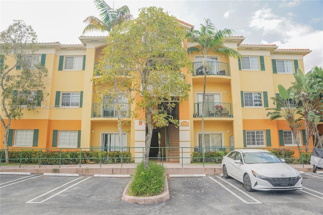 7200 NW 114th Ave Unit 305, Doral, FL 33178 - view of apartment building / complex with uncovered parking