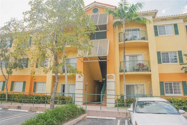 7200 NW 114th Ave Unit 305, Doral, FL 33178 - view of property with uncovered parking