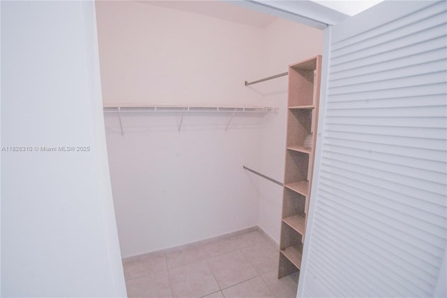 7200 NW 114th Ave Unit 305, Doral, FL 33178 - spacious closet with light tile patterned floors