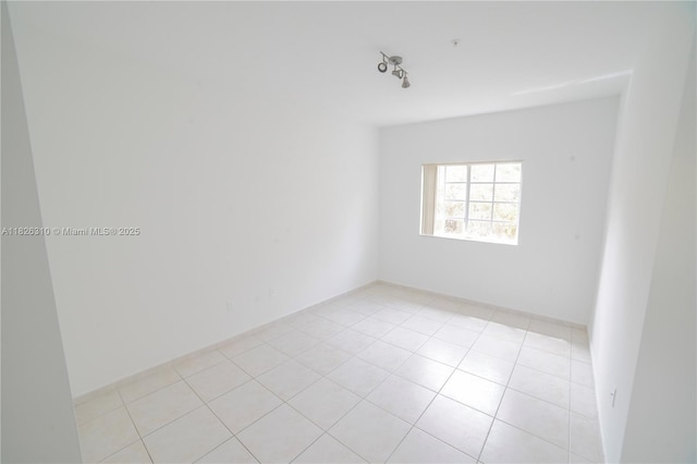 7200 NW 114th Ave Unit 305, Doral, FL 33178 - empty room featuring light tile patterned floors