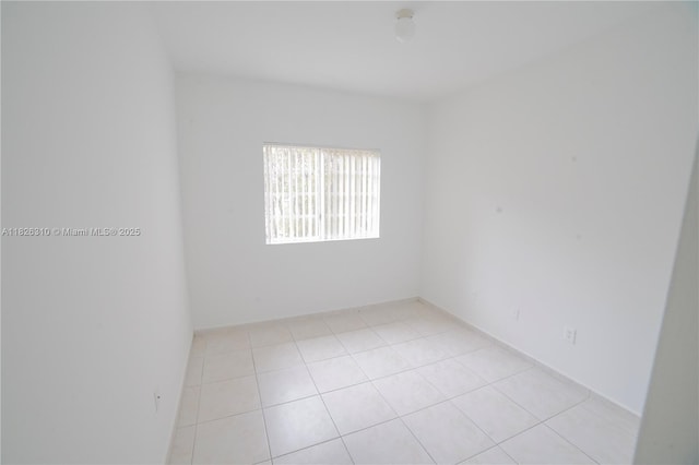 7200 NW 114th Ave Unit 305, Doral, FL 33178 - spare room featuring light tile patterned flooring