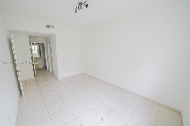 7200 NW 114th Ave Unit 305, Doral, FL 33178 - unfurnished room with light tile patterned floors