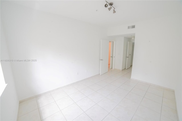 7200 NW 114th Ave Unit 305, Doral, FL 33178 - empty room featuring light tile patterned flooring