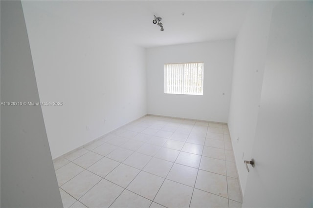 7200 NW 114th Ave Unit 305, Doral, FL 33178 - empty room featuring light tile patterned flooring