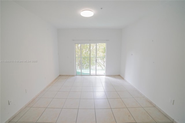 7200 NW 114th Ave Unit 305, Doral, FL 33178 - spare room featuring light tile patterned flooring
