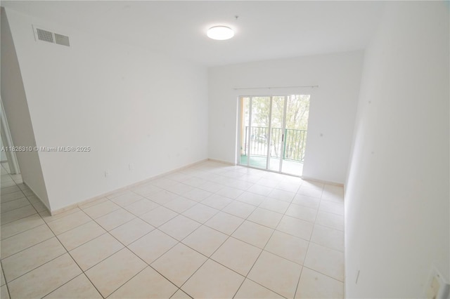 7200 NW 114th Ave Unit 305, Doral, FL 33178 - unfurnished room with light tile patterned flooring