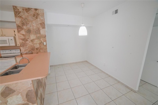 7200 NW 114th Ave Unit 305, Doral, FL 33178 - unfurnished dining area with a sink and light tile patterned floors