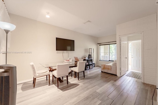370 Lake Monterey Cir, Boynton Beach, FL 33426 - dining room featuring light wood finished floors and baseboards