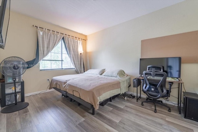 370 Lake Monterey Cir, Boynton Beach, FL 33426 - bedroom featuring wood finished floors and baseboards