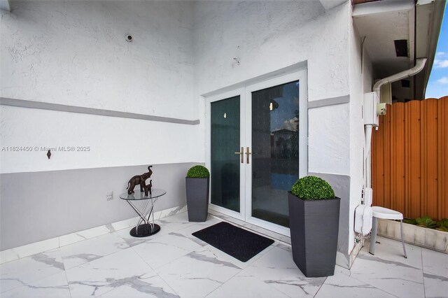8905 NW 112th St, Hialeah Gardens, FL 33018 - view of patio / terrace featuring french doors
