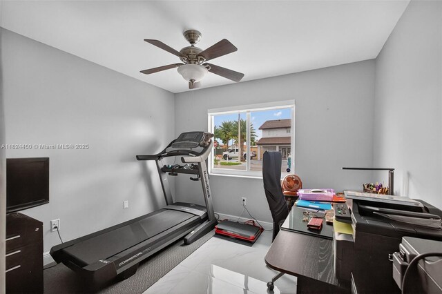 8905 NW 112th St, Hialeah Gardens, FL 33018 - exercise room featuring marble finish floors and ceiling fan